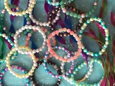 Dive into a world of enchantment with our Handmade Iridescent Bead Bracelets. Inspired by our love of mermaids and everything under the sea, their colors are enchanting and ready to make your look pop!  Wear them, stack them, and get ready to get noticed.  We hope you love them as much as we do : ) Iridescent Beaded Bracelets With Colorful Beads As Gift, Iridescent Beaded Bracelets As Gift, Gift Iridescent Beaded Bracelets, Sea Bead Bracelets, Bracelets Bead, Mermaid Bracelet, Mermaid Gifts, Mermaid Jewelry, Owl Earrings