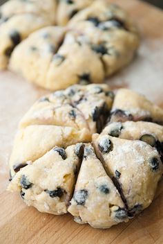 blueberry cookies cut in half on a cutting board