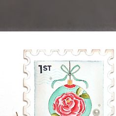 a postage stamp with a rose on it