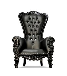 an ornate black leather chair with buttons on the back