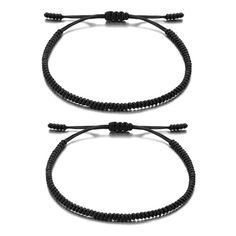 two black cord bracelets on white background