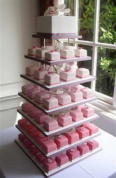 a wedding cake is stacked on top of each other