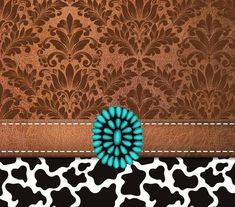 a brown and black wallpaper with a blue flower on it's center piece