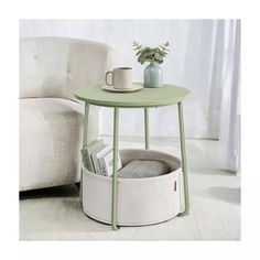 a coffee table with a magazine rack underneath it and a cup on the end table