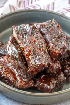 some meat is sitting in a bowl on a table