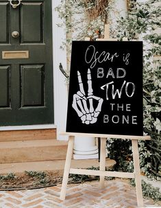 a sign that says, your is bad two the bone on it next to a door