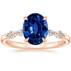 an oval blue sapphire and diamond ring