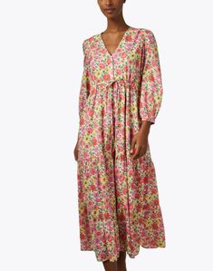 Banjanan's Castor dress perfectly channels the brand's feminine take on artistic prints. Perfect for the transitional season ahead, it features an all-over floral motif, balloon sleeves, cinch tie waist, and tiered maxi hem. Style yours with sandals and a coordinating clutch for a fun daytime look. Floral Print Maxi Dress For Daywear, Spring Tiered Maxi Dress With Print, Spring Tiered Maxi Dress With Printed Details, Spring Printed Tiered Maxi Dress, Tiered Printed Midi Dress For Spring, Printed Tiered Midi Dress For Spring, Spring Floral Print Tiered Beach Dress, Spring Beach Tiered Dress With Floral Print, Spring Floral Print Tiered Dress For Beach