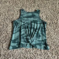 Youth Xl. Never Worn. True To Size. Camo Tie Front Tank Top. Summer Stretch Camouflage Tops, Casual Green Tank Top, Casual Camouflage Tops For Spring, Spring Stretch Camouflage Top, Casual Camouflage Tank Top For Summer, Casual Camouflage Tank Top, Sleeveless Camouflage Cotton Top, Casual Camouflage Sleeveless Top, Sleeveless Camouflage Top For Spring