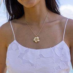 The Plumeria line is inspired by exotic Plumerias which are found blooming on every Hawaiian Island. Evoke the unique fragrance found in these beautiful blossoms and rediscover memories in Paradise with our Plumeria Collection. Plumeria Design Pendant 14k Yellow Gold 28mm Natural Diamond: 0.175 CTW Chain not included, Shop Chains Now Exclusively Made in Hawaiʻi Forever Guarantee (Warranty on the life of the piece) Free Shipping on USA Orders $100 or more Plumeria Design, Faith Love, Unique Fragrance, Hawaiian Islands, Pave Diamonds, Satin Finish, Natural Diamonds, Paradise, Diamonds