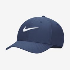 the nike golf cap is shown in blue and has a white nike logo on it