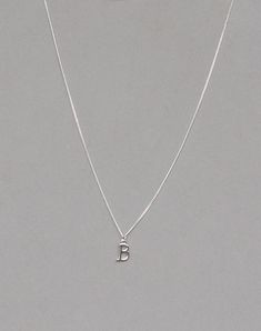 The initial is silver plated and measures 10 mm x 15 mm. It is strung on a silver plated tiny 1.3 mm curb chain with a lobster clasp closure. Choose the length from the drop down. To add a birthstone charm to this necklace, follow link below to purchase the charm. https://www.etsy.com/listing/634099372/add-a-birthstone-charm?ga_search_query=add&ref=shop_items_search_1 Classic Silver Charm Necklaces With Initials, Silver Dainty Charm Necklaces With Box Chain, Dainty Silver Charm Necklaces With Box Chain, Silver Sterling Silver Initial Necklace With Charms, Silver Adjustable Initial Pendant Charm Necklace, Sterling Silver Initials Charm Necklace For Birthday, Silver Sterling Silver Initials Charm Necklace, Adjustable Silver Charm Necklace With Initials, Classic Silver Nickel-free Charm Necklace