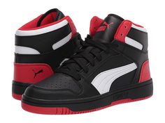 PUMA Kids Rebound Layup Sl (Big Kid) - Kid's Shoes : Puma Black/High Risk Red/Puma White : The Puma Kids Rebound Layup Sl sneaker gives off an old-school vibe with its high-top design in a faux-leather upper. Lace-up closure. Brand logo detail at tongue and back. Round-toe construction with perforated detail at vamp. Soft fabric lining. Softfoam sockliner provides comfort and cushioning. Rubber outsole. Imported. Measurements: Heel Height: 1 1 10 in Weight: 10.8 oz Platform Height: 4 5 in Produc Casual High-top Leather Basketball Shoes, Puma Basketball Shoes With Round Toe, Puma Logo High-top Leather Sneakers, High-top Leather Puma Sneakers, Leather High-top Puma Sneakers, Casual Puma Basketball Shoes In Synthetic, Mid-top Synthetic Puma Sneakers, Puma Logo High-top Sneakers For Sports, High-top Puma Sneakers For Sports