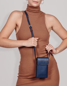 Crafted from luxury leftover leathers, our new Phone Sling has enough space for you phone, cards and some gloss. Phone Cards, New Phone, Saddle Brown, Black Phone, Navy Blue Color, New Phones, Pebbled Leather, Brown Color, Luxury Branding