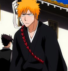 an anime character with orange hair and black clothes standing in front of a white building