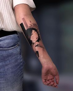 a person with a tattoo on their arm