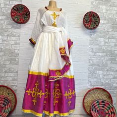 Beautiful Ethiopian and Eritrean Habeshan Dress. Stylish Menen, 100% Cotton We recommend hand washing and air drying to make it last longer. A low heating iron will also keep design and look. Beautiful Habeshan Dress |Ethiopian Traditional Dress|Eritrean Dress|Habesha Kemis|Zuria|Habesha Chiffon|Kemis Traditional White Silk Kaftan, Traditional Silk Tunic Dress, Zuria Habesha Dress, Habesha Chiffon, Ethiopian Dresses, Eritrean Dress, Paleo Hebrew, Beautiful Ethiopian, Habesha Dress