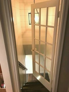 an open door leading to a hallway in a house