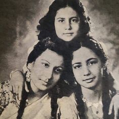 an old photo of three women with long hair