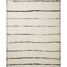 a white rug with black lines on it