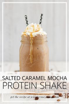 salted caramel mocha protein shake in a mason jar with whipped cream on top