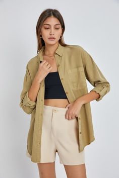 Ladies Utility Shirt Stella Utility Shirt Oversized Utility Button Down. This Button down top has long sleeves with roll-up cuffs and chest pockets. Light and soft make for great layering for Spring and Summer! 100% Soft Tencel Ships within 1-2 days