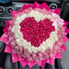 a car dashboard with a heart made out of flowers