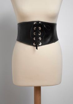 Black lace up corset belt handmade in our atelier with genuine leather. Soft, fashionable and easy to wear. It's tied to the front with leather strips but also it has an elastic piece and three snaps on the back that allow you to wear and remove it easily. You can wear it over a blouse, tunics, with blazers, long baggy shirts and all kind of dresses. This beautiful belt can make your style more casual and sexier: cinch it to your waist and get curves instantly. ##MEASURES: Front Width: 5.9 inche Medieval Corset, Black Corset Belt, Cincher Belt, Baggy Shirts, Wide Belts For Women, Medieval Belt, Waist Corset, Plus Size Corset, Lace Tights