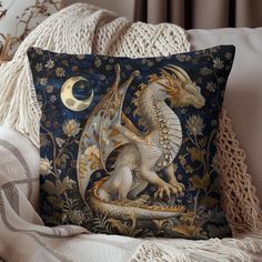 a decorative pillow with a dragon on it