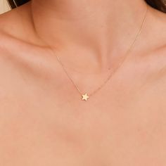 Capella A night sky’s dream. Add a touch of celestial magic to your everyday style with this dainty Mini Star Necklace, crafted entirely in solid gold. This dainty piece features a tiny, gleaming star pendant suspended on a shimmering chain, catching the light with every movement. Wear it on its own for a whisper of understated elegance or layer it with other necklaces for a bolder, personalized look. - Handmade- Solid Gold- Star Size: 8 mm All pieces come beautifully boxed in suede pouches you can always use when traveling! Hoco 2024, Gold Star Necklace, Celestial Magic, Necklace Star, Star Necklace Gold, Magical Jewelry, Cute Stars, Pretty Jewelry, Star Jewelry