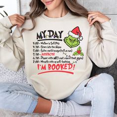 Funny Christmas Gift,Grinch I'm Booked  Get into the holiday spirit with our "My Day I'm Booked" Christmas sweatshirt! Featuring the mischievous Grinch and a fun Jazzercise twist, this funny Christmas gift is perfect for spreading cheer. With phrases like "Grinch I'm Booked" and "My Day Is Booked Grinch," it's an ideal choice for anyone who loves a playful holiday design. -------------------------------------------- Gildan Unisex Sweatshirt -Soft preshrunk 50% cotton, 50% polyester -Medium-heavy Christmas Schedule, Grinch Christmas Sweater, The Grinch Christmas, Grinch Shirts, Christmas Sweaters For Women, Christmas Crewneck, Holiday Sweatshirt, Funny Christmas Shirts, Grinch Christmas