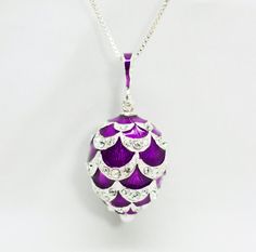 "Large rich purple 3 D pendant with clear crystals, enameled over solid sterling silver, created in our NJ shop in the tradition and spirit of Faberge jewelry.   The pendant is about 1.00\" (24 mm ) without a bail for a chain.  We make it in a verity of colors, so don't hesitate to ask for your favorite tone. Just keep in mind that we will need 1 to 4 weeks to make a new piece if we do not have it in stock.   It comes with 18\" sterling silver chain and in a gift box. If you feel that you need a Purple Enamel Necklace For Gift, Purple Enamel Necklace For Gifts, Nickel-free Purple Enamel Jewelry, Purple Necklace With Polished Finish As Gift, Silver Enamel Locket Necklace, Purple Enamel Pendant Jewelry, Silver Enamel Necklace For Anniversary, Purple Locket Jewelry For Gift, Silver Enamel Teardrop Jewelry