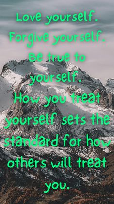 a mountain with the words love yourself, forgive yourself