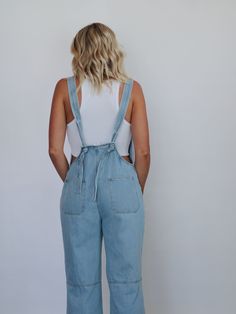 The "All American" overalls feature a straight neckline, front metal buttons, front side pockets, thick straps around the lower back, and ankle-length wide legs. True to size, little to no stretch Krista is wearing a Medium Krista's measurements: Waist- 27" Hips- 38" Height- 5'10" Bust- 34" (Typically a Medium) 100% COTTON Spring Shortalls With Suspenders, Medium Wash Overall Shortalls With Suspenders, Medium Wash Shortalls With Suspenders, Medium Wash Full Length Overalls For Spring, Full-length Medium Wash Overalls For Spring, Full Length Medium Wash Overalls For Spring, Spring Overalls With Adjustable Straps, Straight Leg Cotton Overalls With Button Closure, Spring Utility Overall Jeans