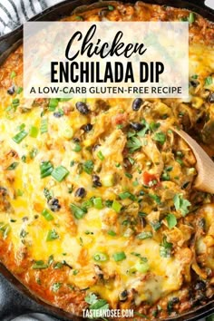 chicken enchilada dip in a skillet with a wooden spoon