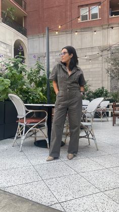 The year-round, wear it everywhere, must have jumpsuit is here! Featured in a subtle charcoal wash, relaxed fit at the bodice, with front zip closure, utility pockets and classic collared neckline. 100% Cotton Relaxed fit fits true to size @ruderebelle wearing a size small Utility Jumpsuit Street Style, Coverall Outfit Women, Boilersuit Outfit, Boiler Suit Outfit, Utility Jumpsuit Outfit, Coveralls Outfit, Coverall Outfit, Utility Jumpsuit, Boiler Suit