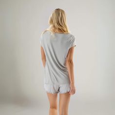 The only thing Classic about this V-Neck Tee is its style – The breathable fabric and elegant drape provide a refreshing new take on your favorite old T-shirt. Fitted at the chest with a comfortable flow down the middle, this Classic Tee’s hemline falls perfectly at mid hip. For discretion, we’ve added a light lining in the chest – not a bra – just a little extra love A classic short sleeve t-shirt with a v-neck design with a light lining at the chest for discretion. True to size, classic t-shirt fit. Super soft pajama t-shirt for lounging at home or throwing over your favorite jeans on the weekend. Pair it with any of our bamboo bottoms. Best Pjs, Classic Pajamas, Black Bamboo, Soft Pajamas, Elegant Drapes, Pink M, Lounge Dress, Old T Shirts, Pajama Shirt