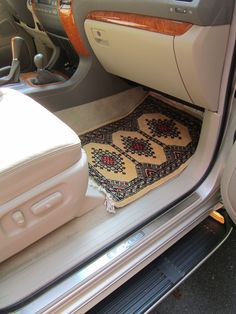 the interior of a car is clean and ready for someone to put their luggage in