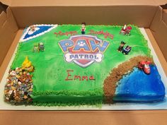 a birthday cake in the shape of a paw patrol theme