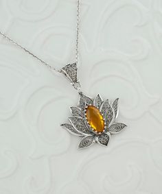 Citrine Silver Victorian Lotus Pendant Necklace, 925 Sterling Silver Artisan Made Filigree Water Lily Floral Women Jewelry, Victoria Flower Gothic goth pendant necklace, handmade pendant, november birthstone, wedding gift her Gemstone: Citrine 7x14 mm. Material: 925 Sterling Silver ( NICKEL FREE ) -The stone used in this jewelry, is the birthstone for Scorpio and the month of November. Chain Length: -21 Inches ( 53 cm ) -18 Inches + 2 Inches Extender ( 46 cm + 5 cm Extender ) Pendant height and Amber Sterling Silver Jewelry For Wedding, Sterling Silver Ornate Flower Jewelry, Ornate Sterling Silver Flower Jewelry, Ornate Amber Jewelry For Gift, Traditional Amber Sterling Silver Jewelry, Goth Pendant, Lotus Pendant, November Birthstone, Luxury Gift Box