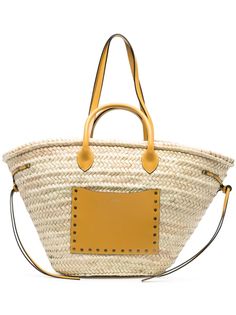 Cadix straw tote bag from ISABEL MARANT featuring beige, mustard yellow, straw, faux-leather trim, logo stamp to the front, interwoven design, two long top handles, side tie fastening, front patch pocket and main compartment. Designer Straw Bag With Handles For Vacation, Designer Straw Bag For The Beach, Designer Beach Straw Bag, Designer Beach Straw Bag With Handles, Designer Double Handle Straw Beach Bag, Designer Straw Basket Bag With Braided Handles, Designer Straw Basket Bag With Leather Handles, Luxury Straw Bag With Rolled Handles For Beach, Luxury Straw Beach Bag With Rolled Handles