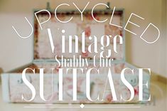 an old suitcase sitting on top of a table with the words vintage, shabby chic