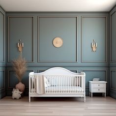 a baby's room with a white crib and blue walls