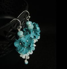 If you do not want or cannot pay using PayPal, select Other payment, and then follow this link https://checkout.seller-online.net/?morecolors Tender earrings with cute hand made flowers. This is a lovely earrings. Light teal mint ombre flowers and crystal beads. Long, unique eye catching design of jewelry. Buy this beautiful earrings for yourself or someone special. You can place an order with colors you love to be made just for you. For special order I need 3 to 7 days before I can ship. The le Purple Statement Earrings, Ombre Flowers, Made Flowers, Bridesmaid Gifts Earrings, Bridesmaids Jewelry, Teal Earrings, Bridesmaid Gifts Jewelry, Prom Jewelry, Decoration Originale