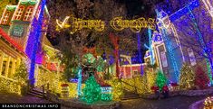 christmas lights decorate homes and trees in an area that has been decorated for the holiday season