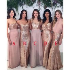 the bridesmaids are all wearing different dresses