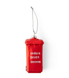 a red recycle can with the words reduce reuse and recycle on it