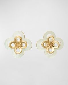 Tory Burch earrings    18karat gold plated brass and motherofpearl    Signature doubleT logo    For pierced ears    Imported Tory Burch Earrings, Tory Burch Kira, Clover Earrings, Pierced Ears, Timeless Pieces, Ear Piercings, Luxury Branding, Neiman Marcus, Top Designers