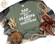 Grandpa Shirt, Dad Knows A Lot Grandpa Knows Everything T-shirt, Humorous Grandfather Gift, Fathers Day Gift Shirt, Grandpa Birthday Gift HOW TO ORDER 1-) Please, check and review all the photos. 2-) Choose your t-shirt size and color. *Different styles of shirts may have different shades of the same color choice due to different manufacturer brands. *For this reason, we recommend matching shirts from the same styles if you want precisely matching colors (ex. Unisex, V-necks, Toddler, etc.). 3-) Green Father's Day T-shirt With Letter Print, Green Letter Print T-shirt For Father's Day, Green T-shirt With Letter Print For Father's Day, Father's Day Gift Tops With Letter Print, Graphic Tee Shirt For Father's Day Gift, Father's Day Gift Graphic Tee Shirt, Graphic Print Shirt For Father's Day Gift, Father's Day Gift Graphic Print Top, Father's Day Graphic Tee With Lettering