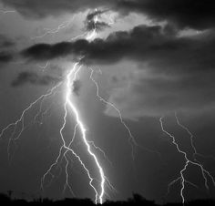 black and white photograph of lightning in the sky